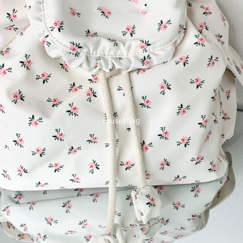 Korean style women's temperament lightweight floral bag new small fresh girl commuting backpack versatile simple and large capacity canvas backpa