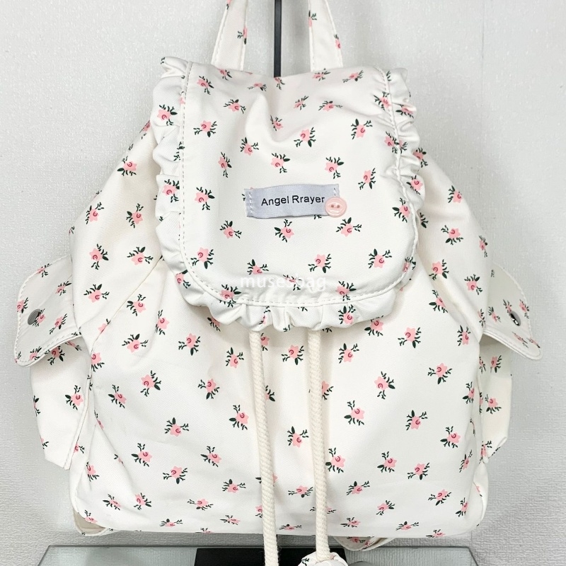 Korean style women's temperament lightweight floral bag new small fresh girl commuting backpack versatile simple and large capacity canvas backpa