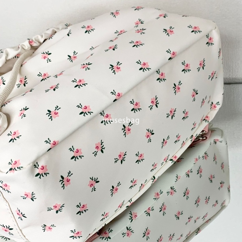 Korean style women's temperament lightweight floral bag new small fresh girl commuting backpack versatile simple and large capacity canvas backpa