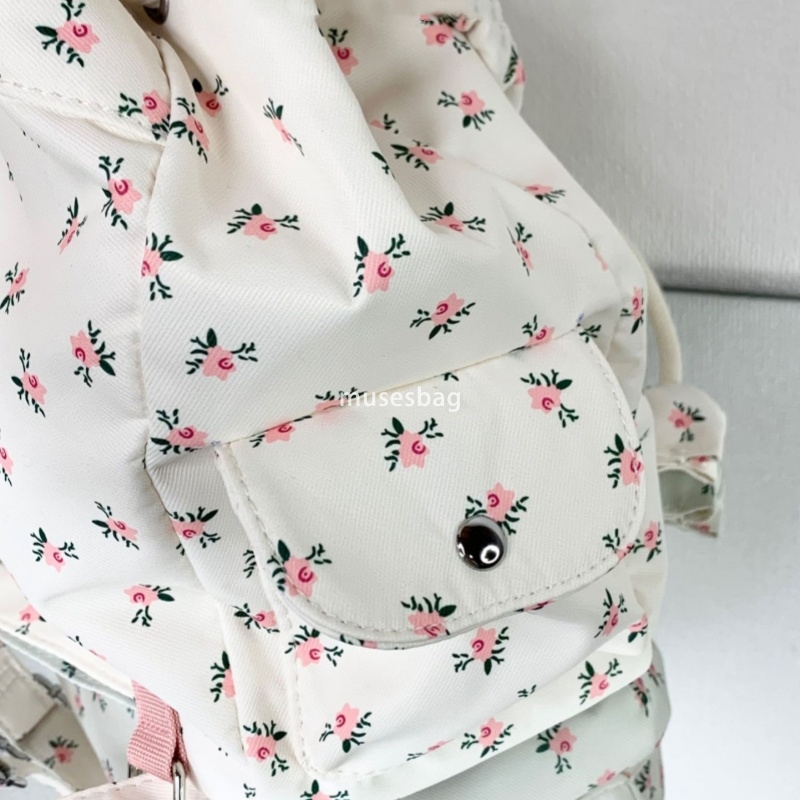 Korean style women's temperament lightweight floral bag new small fresh girl commuting backpack versatile simple and large capacity canvas backpa