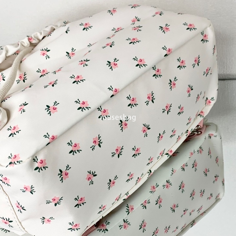 Korean style women's temperament lightweight floral bag new small fresh girl commuting backpack versatile simple and large capacity canvas backpa
