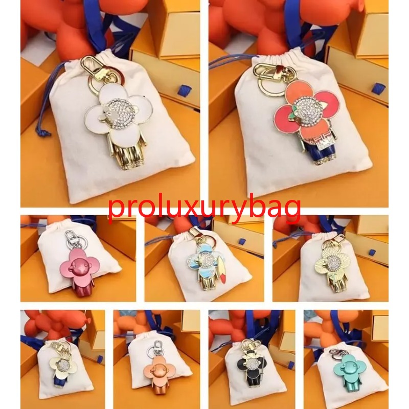 High Quality Keychain Classic Luxury Designer Sunflower Key Chain Men Car Keyring Women Buckle Keychains Bags Pendant Exquisite Gift No Box and No Dustbag J99