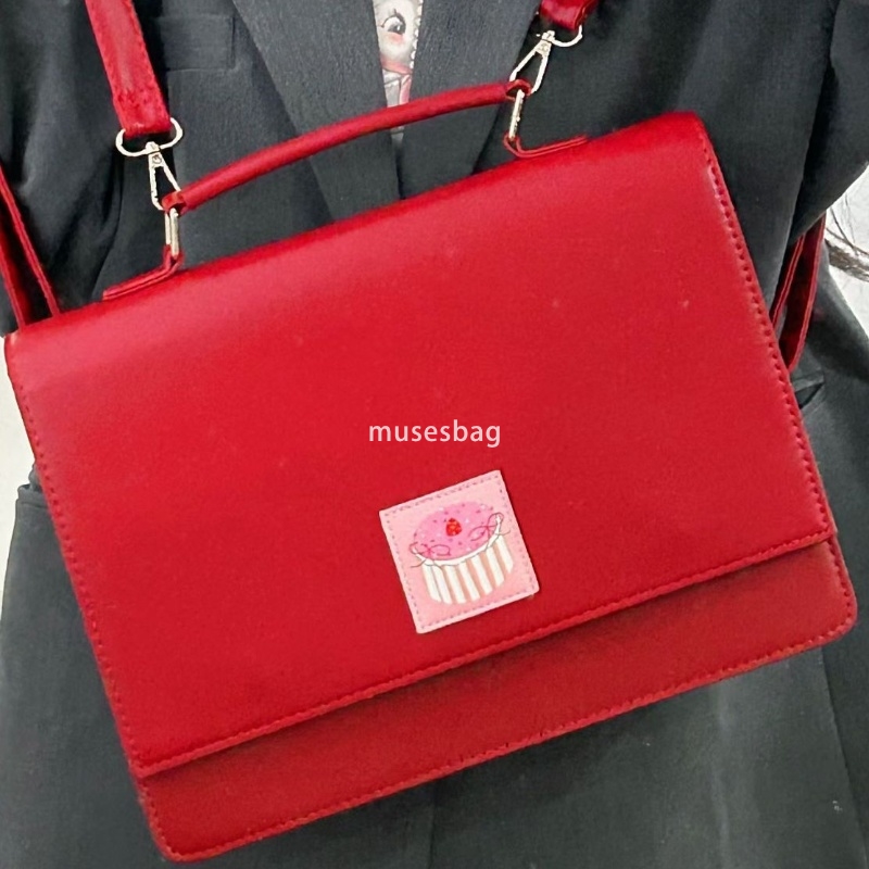 Designer Ms Atmosphere Academy Style Retro Red Large Capacity Backpack Small and Multi functional Handheld Diagonal Straddle Bag Student Commuting Bac