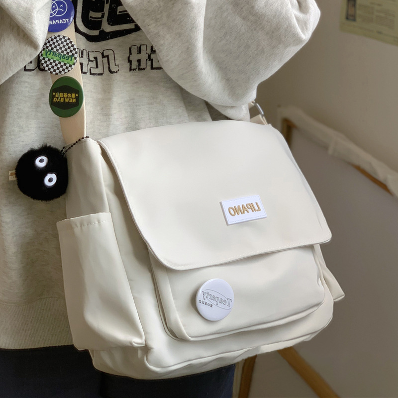Top Canvas Youth Ladies Messenger Korean Style Female Students Nylon Handbags Shoulder Bag Men Letter Crossbody Bags H7.4#11 zhanyishengli