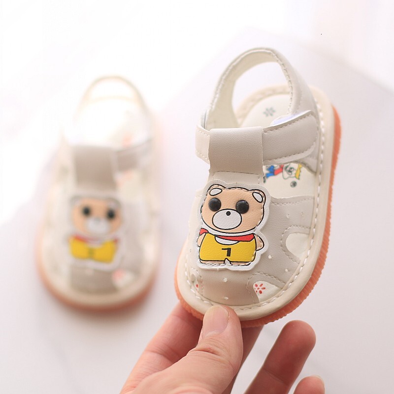 Children's sandals, baotou, summer 0-2 years old, called girls, infants, toddlers, walking shoes, soft soles, male baby shoes will make a noise F
