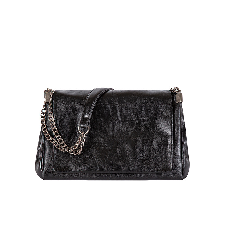 Fashionable and trendy niche design bag for women's new trendy black rock style flip bag chain strip single shoulder crossbody wandering bag