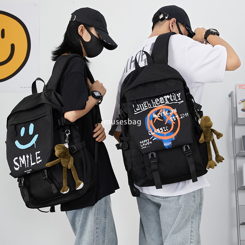 Korean version of unisex high-end fashion computer backpack for middle and high school students simple and large capacity smiling face leisure backpac