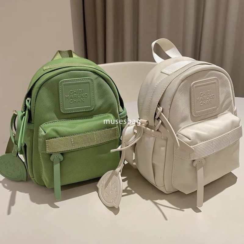 Japanese women's temperament niche mini compact practical backpack solid color bright color macaron green small backpack for travel and shopping 