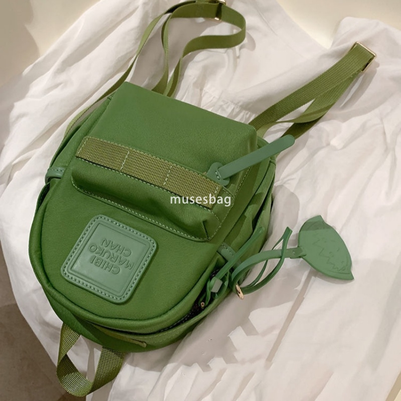 Japanese women's temperament niche mini compact practical backpack solid color bright color macaron green small backpack for travel and shopping 