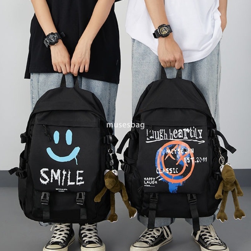 Korean version of unisex high-end fashion computer backpack for middle and high school students simple and large capacity smiling face leisure backpac