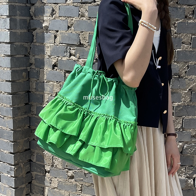 High quality niche design simple and casual bucket bag women's summer new large capacity lace canvas bag commuting bag