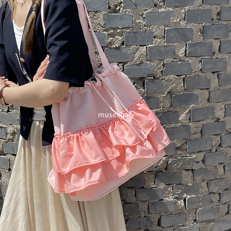 High quality niche design simple and casual bucket bag women's summer new large capacity lace canvas bag commuting bag