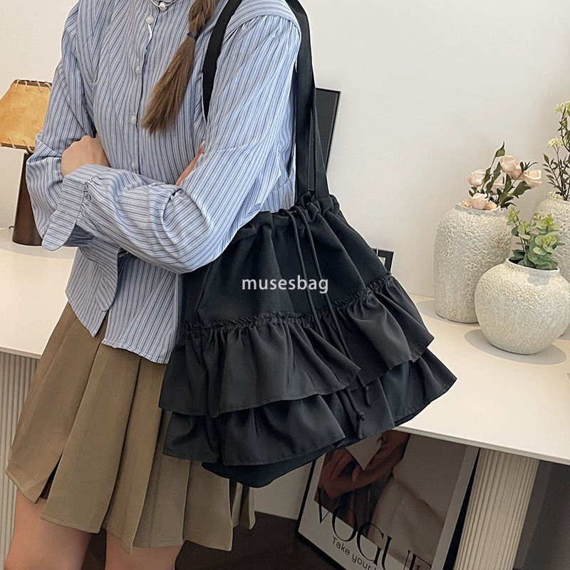 High quality niche design simple and casual bucket bag women's summer new large capacity lace canvas bag commuting bag