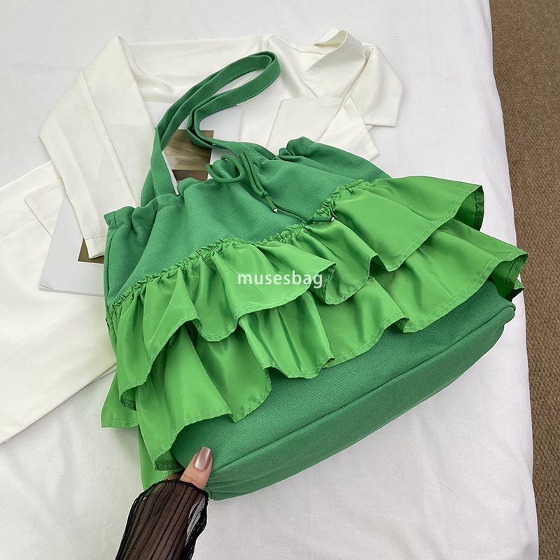 High quality niche design simple and casual bucket bag women's summer new large capacity lace canvas bag commuting bag