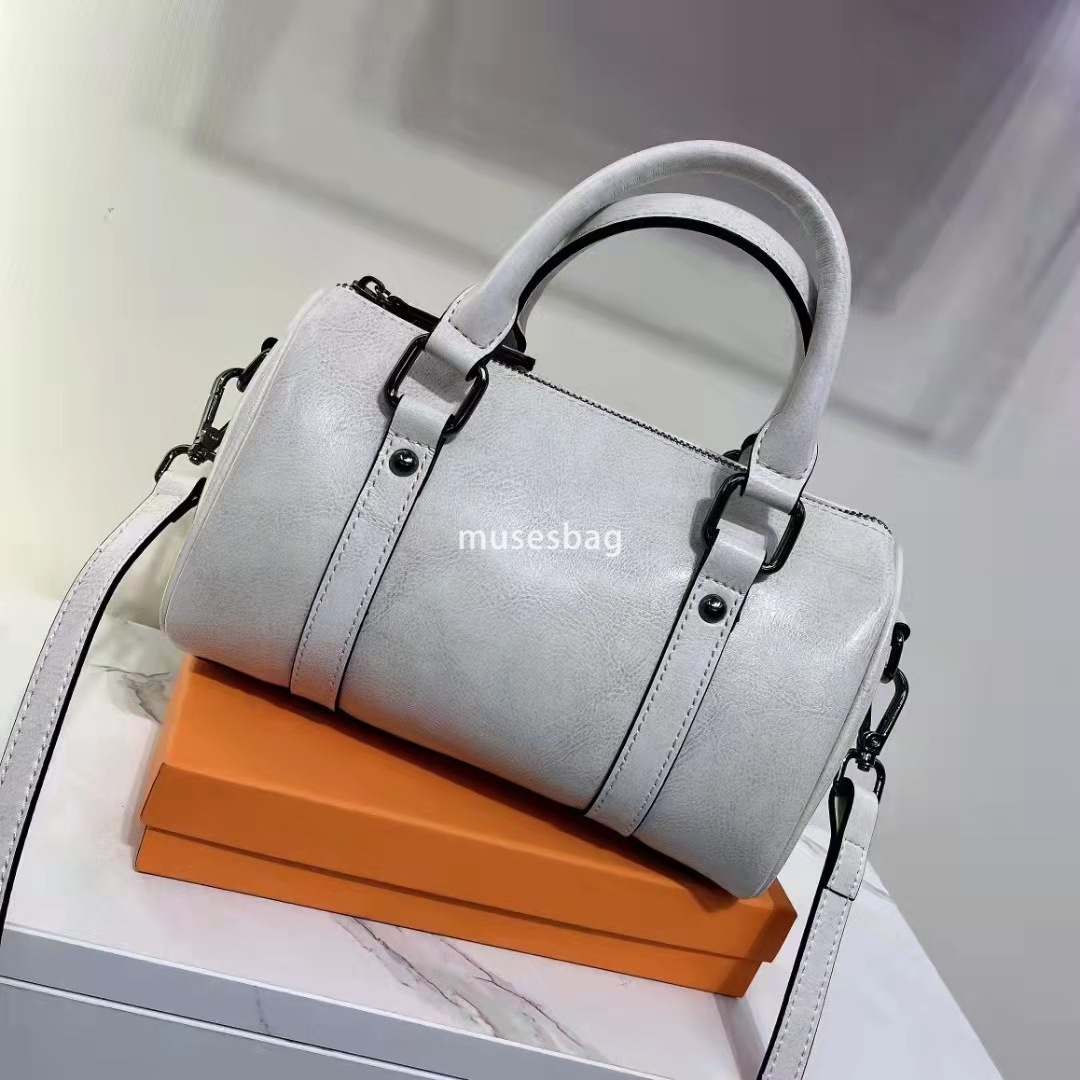 Street trend fashion niche design new pillow bag versatile genuine leather women's bag handbag oil wax leather one shoulder crossbody