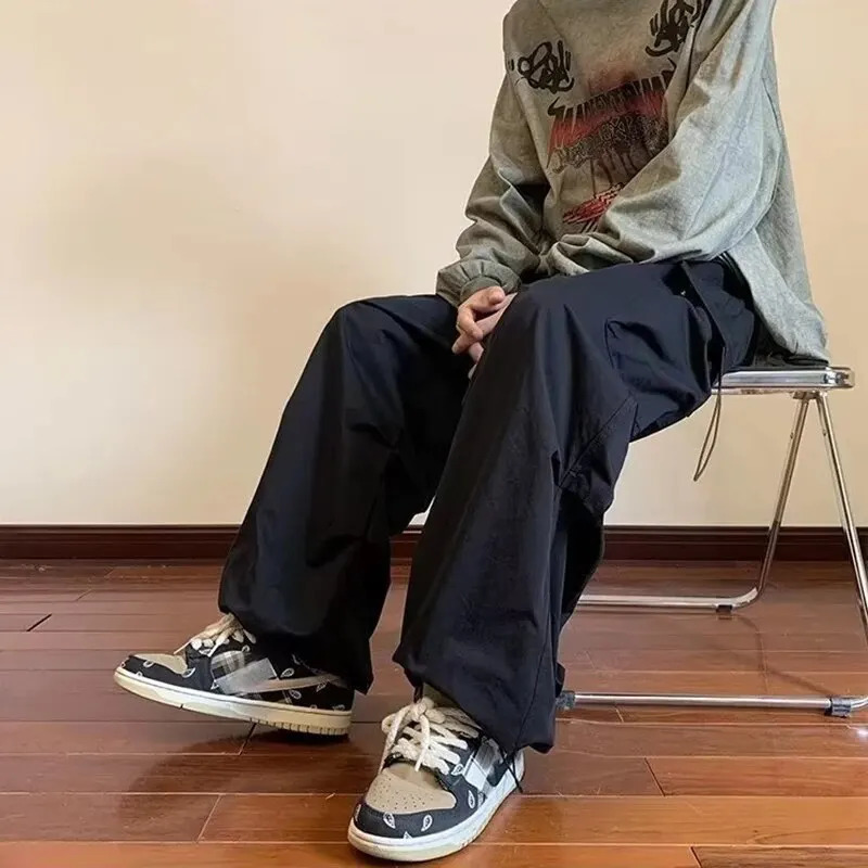 2024 Mens Overalls MultiPocket American Hiphop Pants Ins High Street Spring And Autumn Bunched Foot Assault 240701