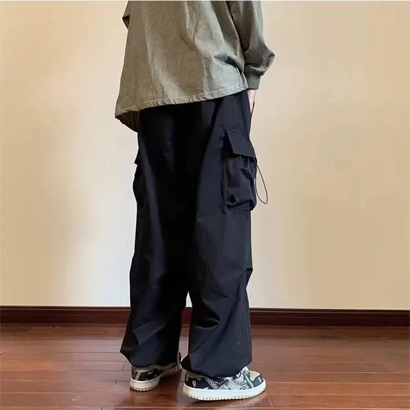 2024 Mens Overalls MultiPocket American Hiphop Pants Ins High Street Spring And Autumn Bunched Foot Assault 240701