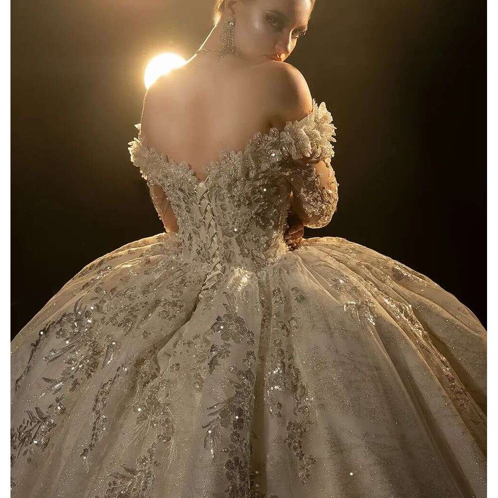 Sparkling Ball Gown Wedding Dress with Off Shoulder Design Beads and Lace Up Back Custom Bridal Wear for a Glamorous Look