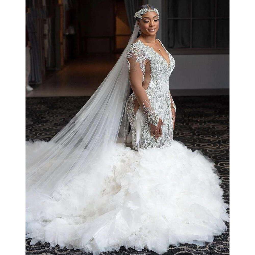 Crystal Princess Amzing Wedding Dresses Illusion Long Sleeve Beaded Plus Size Arabic Aso Ebi Royal Mermaid Bridal Gown