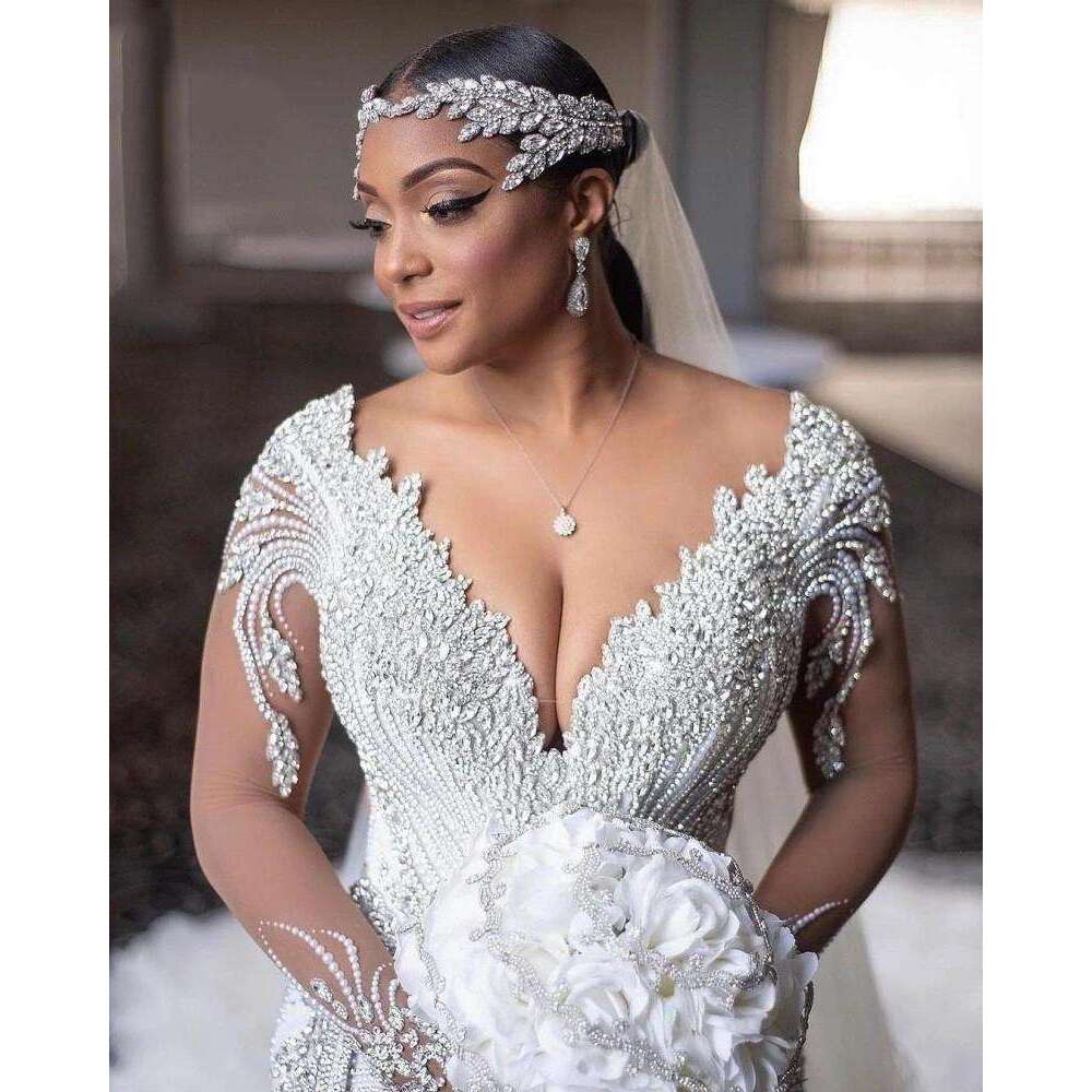 Crystal Princess Amzing Wedding Dresses Illusion Long Sleeve Beaded Plus Size Arabic Aso Ebi Royal Mermaid Bridal Gown