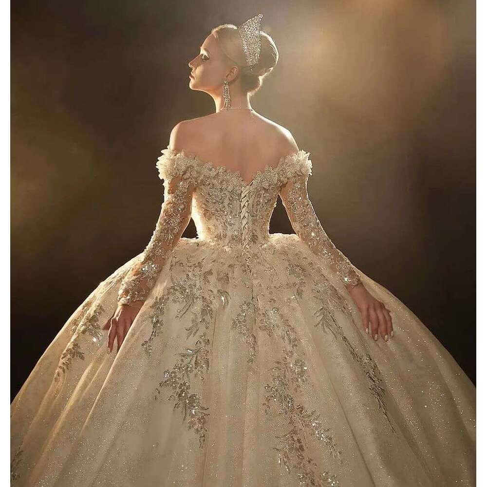 Sparkling Ball Gown Wedding Dress with Off Shoulder Design Beads and Lace Up Back Custom Bridal Wear for a Glamorous Look