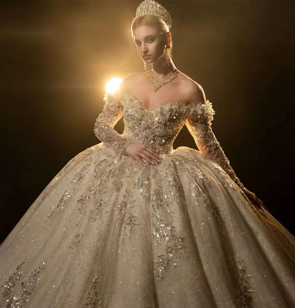 Sparkling Ball Gown Wedding Dress with Off Shoulder Design Beads and Lace Up Back Custom Bridal Wear for a Glamorous Look