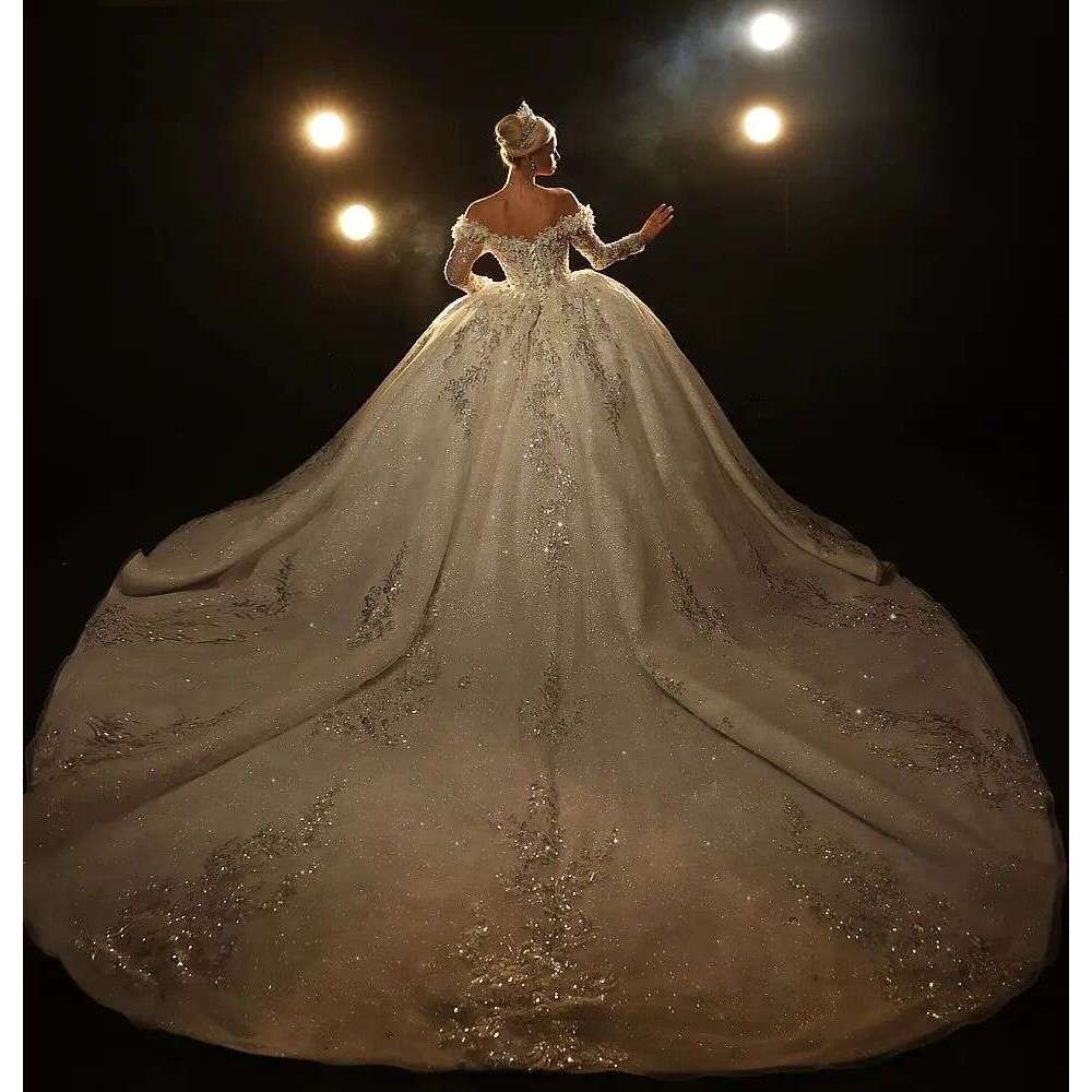 Sparkling Ball Gown Wedding Dress with Off Shoulder Design Beads and Lace Up Back Custom Bridal Wear for a Glamorous Look
