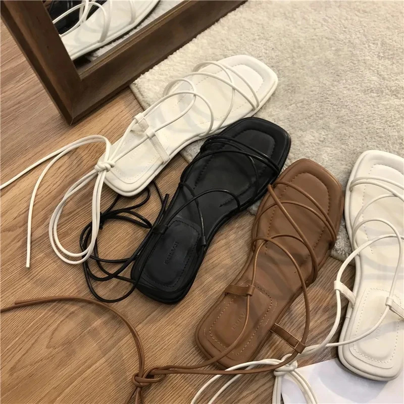 Sandals Womens Summer 2024 Beach Fashion Sexy Flat Casual Cross Tie Open Toe Fairy Style Narrow Band Shoes Black Roman Sandals 240712