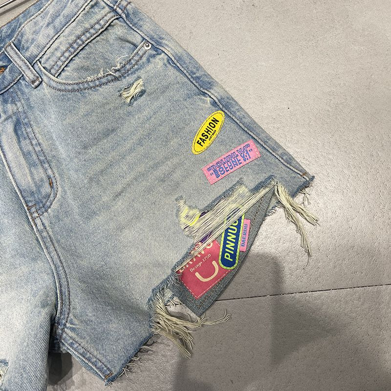 2023 summer new denim high waisted shorts for women worn out Korean version heavy industry splicing wide leg pants hot pants