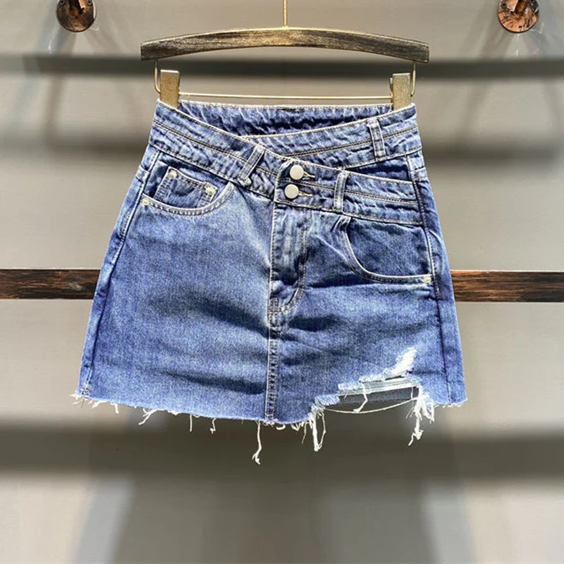The half length skirt Korean high waisted buttocks wrapped short skirt pants for women summer with a hole shaped denim skirt 240709