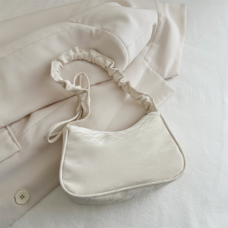 2025 Designer French super 3 style popular niche 2024 new stylish versatile crossbody women's single shoulder armpit bag work small handbag