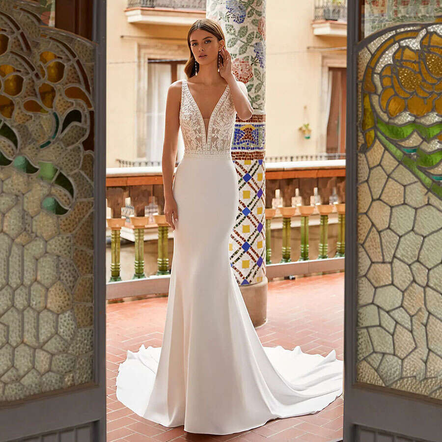 Romantic A-e Wedding Dresses V Neck Illusion Tulle Skirt Spaghetti Strap Bride Gown Mermaid Dress Lace Sexy Backless