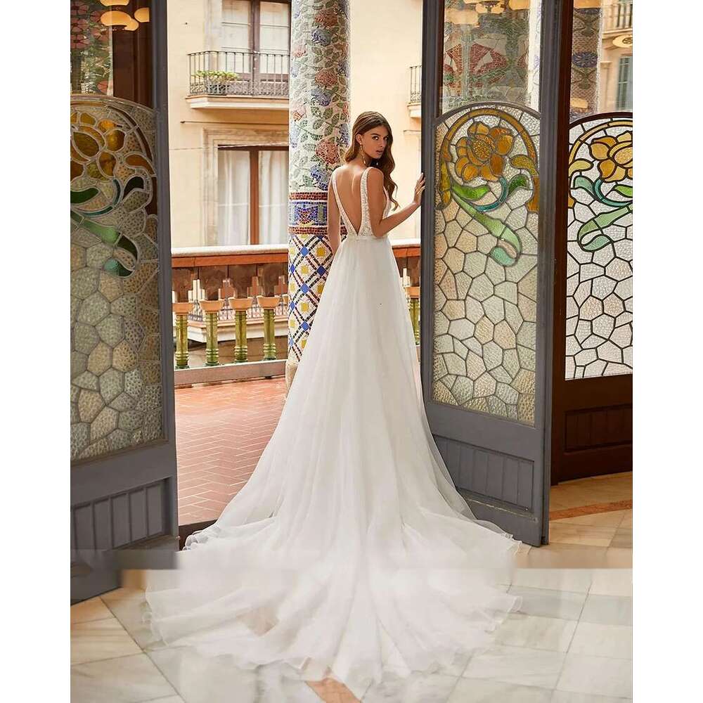 Romantic A-e Wedding Dresses V Neck Illusion Tulle Skirt Spaghetti Strap Bride Gown Mermaid Dress Lace Sexy Backless