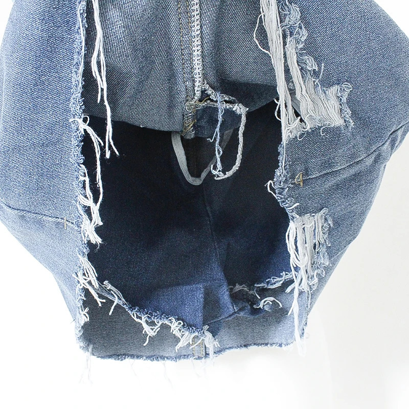 The half length skirt Korean high waisted buttocks wrapped short skirt pants for women summer with a hole shaped denim skirt 240709