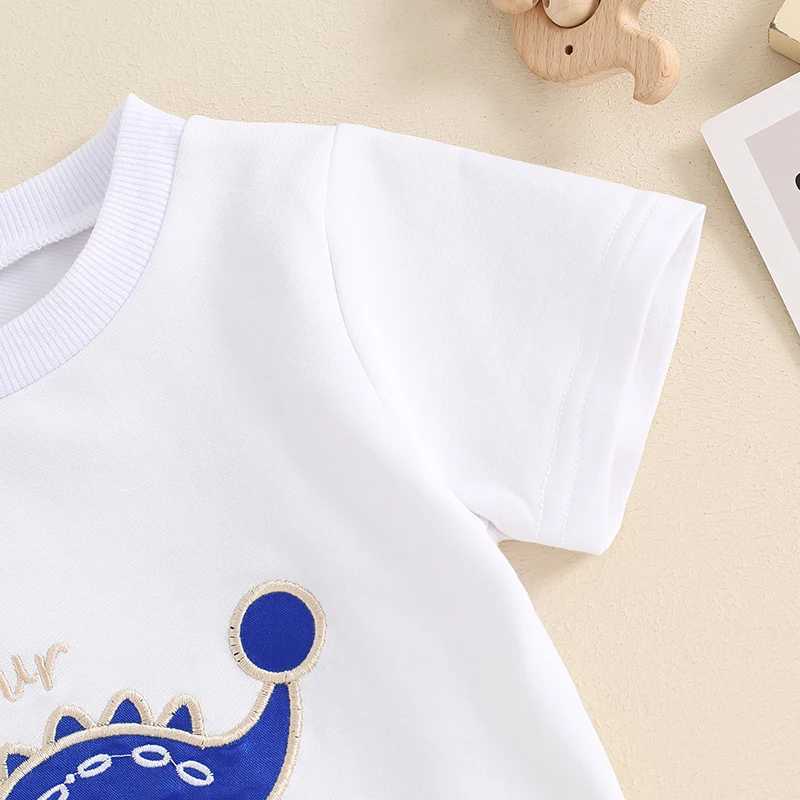 Clothing Sets 2024-03-19 Lioraitiin Toddler Boy Summer Outfit Dinosaur Embroidery Short Sleeve Tops with Elastic Waist Solid Color Shorts Set