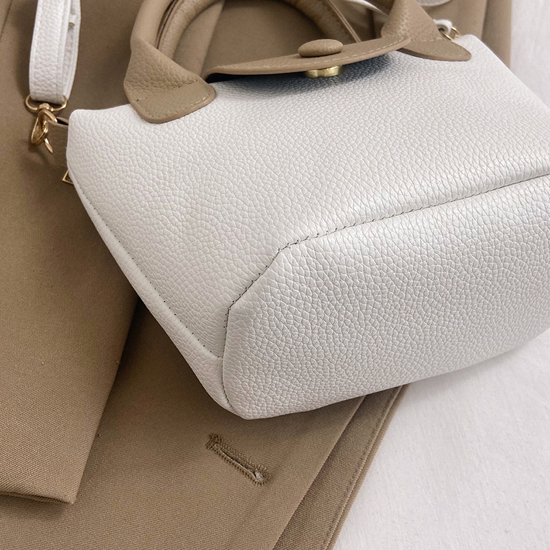 2025 Designer and versatile Fashionable 3 hand-held small for women, new color contrasting casual bucket bag, 2023 summer niche simple crossbody bag w