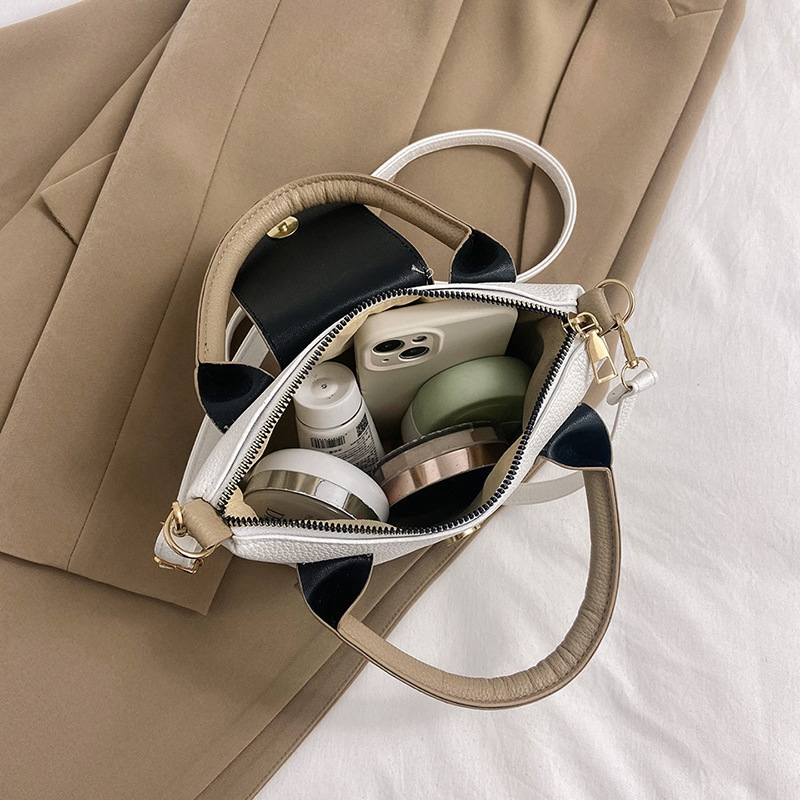 2025 Designer and versatile Fashionable 3 hand-held small for women, new color contrasting casual bucket bag, 2023 summer niche simple crossbody bag w