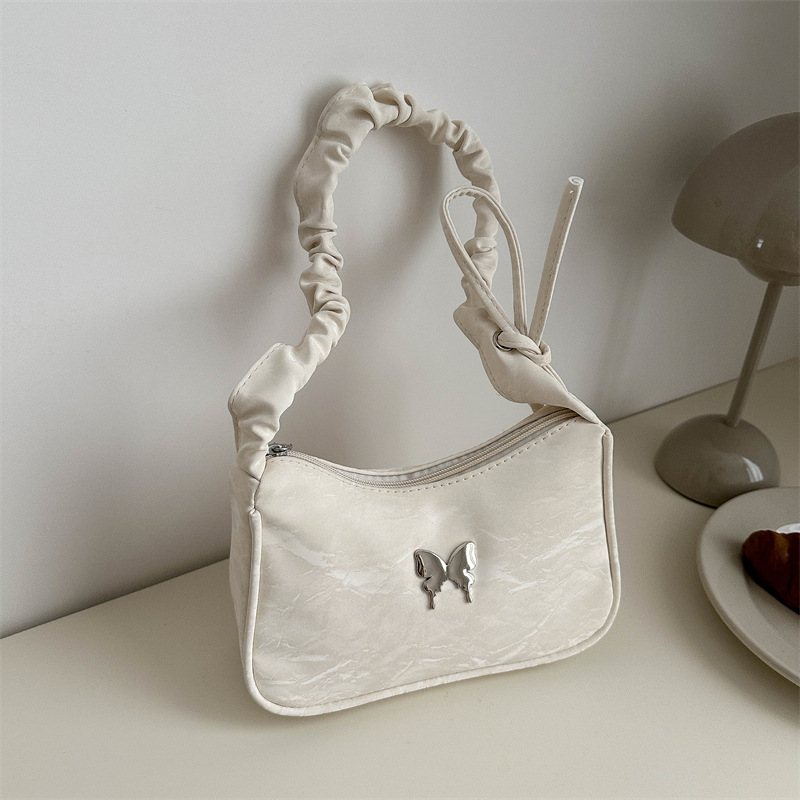 2025 Designer French super 3 style popular niche 2024 new stylish versatile crossbody women's single shoulder armpit bag work small handbag