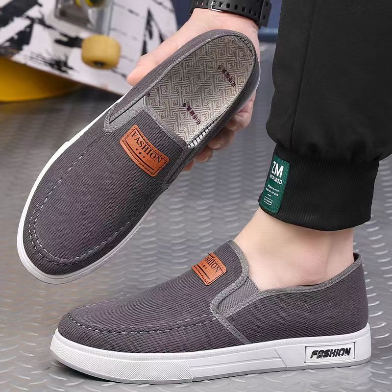 Free shipping men's shoes Spring and Autumn cloth shoes Soft sole Anti slip breathable comfortable casual work shoes Fashion versatile canvas sho