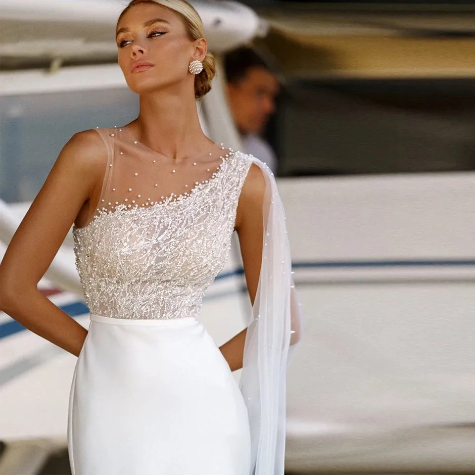 Illusion One Shoulder A-e Wedding Dresses With Ribbon Pearls Beaded Lace Appliques Elegant Ivory Satin Long Bridal Gowns Sleeveless Sheer Jewel Neck
