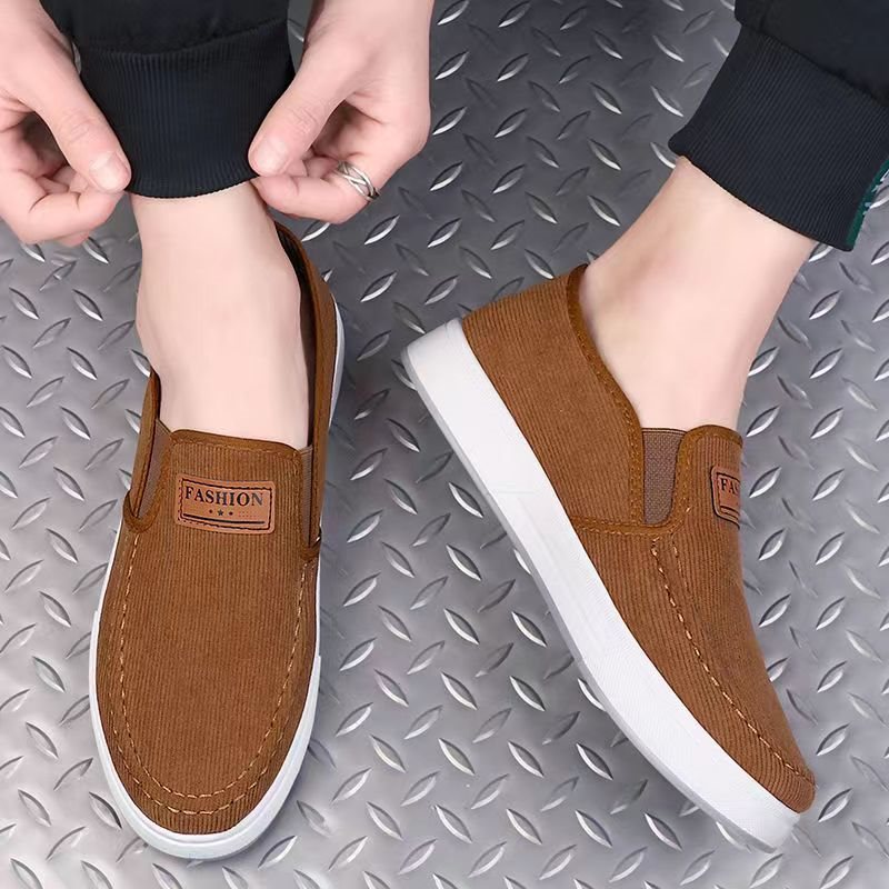 Free shipping men's shoes Spring and Autumn cloth shoes Soft sole Anti slip breathable comfortable casual work shoes Fashion versatile canvas sho