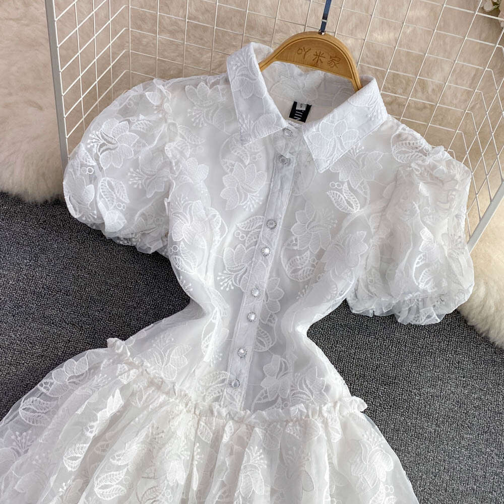 2022 Summer Elegance Super Immortal Polo Collar Single Breasted White Embroidered Bubble Sleeves A-line Cake Dress for Women Round Neck Dress Oversize