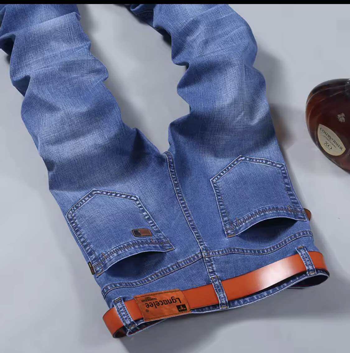 Designer men's jeans for daily wear, outdoor business denim pants, personalized and successful men's outfits