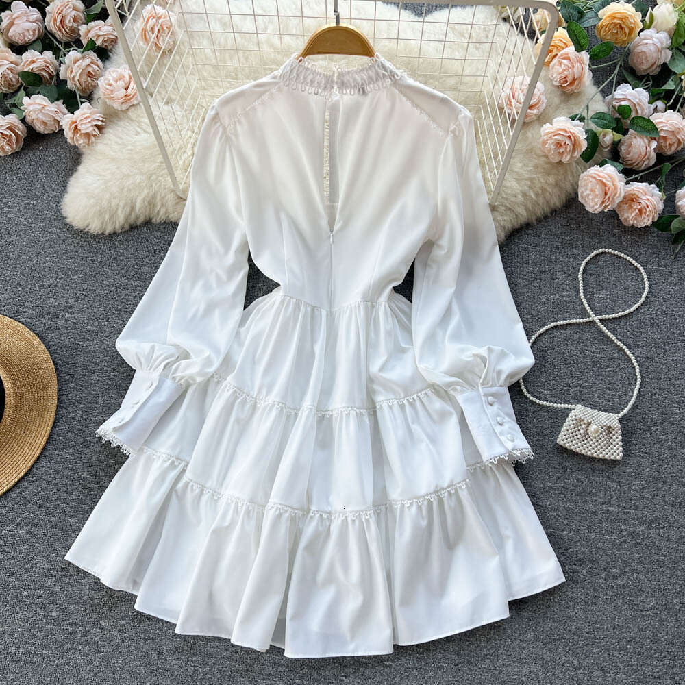 2023 Spring New Instagram Korean Edition Solid Color Long Sleeved Single Breasted Ruffle Edge Shirt Dress Loose Bifurcated Sexy Round Neck Dress