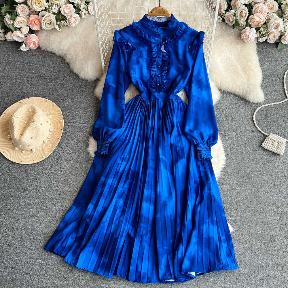 High End Lantern Long Sleeved Stand Up Collar with Ruffled Edges That Wrap Around the Waist for A Slimming Effect. A-line Halo Dye Printed Pleated Dre