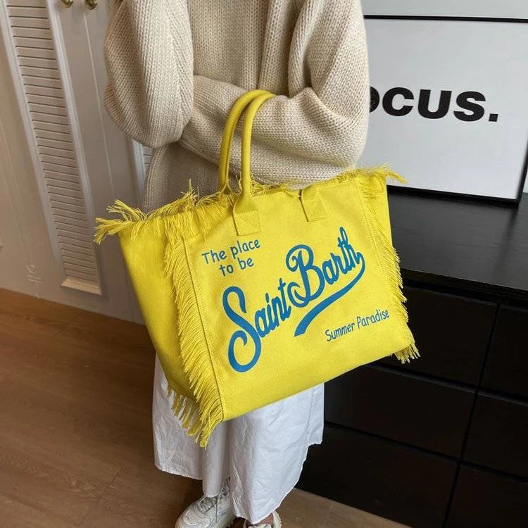 3 2024 selg Large capacity Solid color Fashionable Shoulder Bag Letter Tassel Splice Sewn Handbag 240704 4