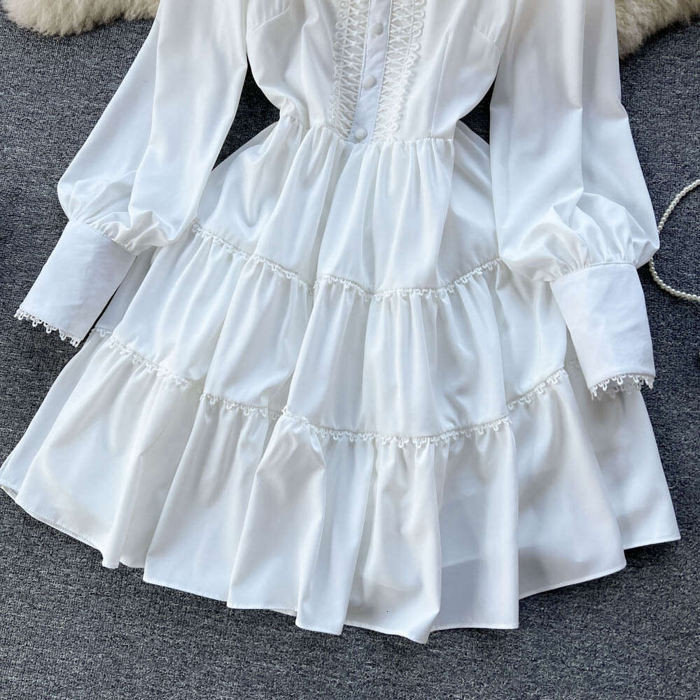 2023 Spring New Instagram Korean Edition Solid Color Long Sleeved Single Breasted Ruffle Edge Shirt Dress Loose Bifurcated Sexy Round Neck Dress