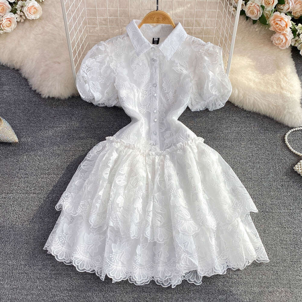 2022 Summer Elegance Super Immortal Polo Collar Single Breasted White Embroidered Bubble Sleeves A-line Cake Dress for Women Round Neck Dress Oversize