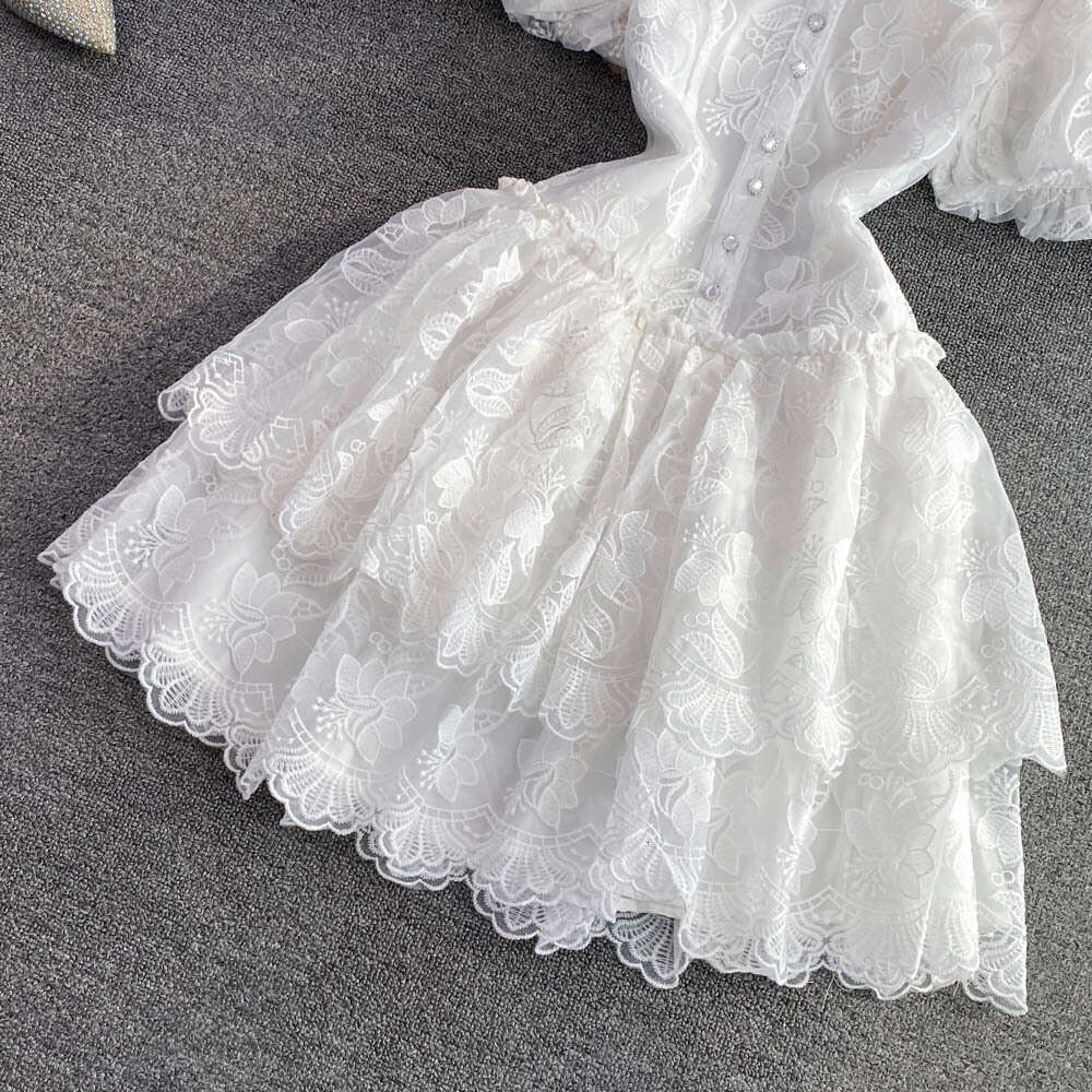 2022 Summer Elegance Super Immortal Polo Collar Single Breasted White Embroidered Bubble Sleeves A-line Cake Dress for Women Round Neck Dress Oversize