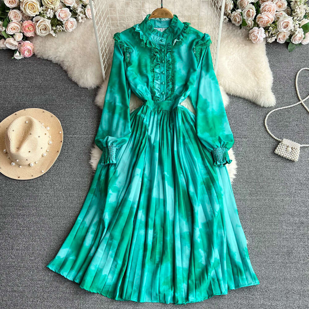 High End Lantern Long Sleeved Stand Up Collar with Ruffled Edges That Wrap Around the Waist for A Slimming Effect. A-line Halo Dye Printed Pleated Dre